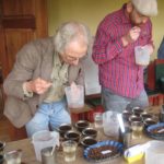 Dr. David Leitner, journeyman cupper, Coffee Analysts taking his first sip
