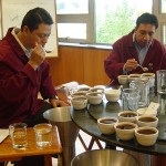 Juan Antonio and Eduardo at the Coffee Analysts cupping table.